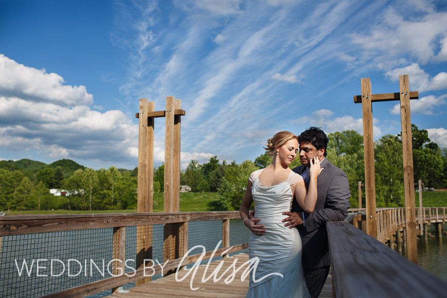 Wedding photos of bride and groom on Rainbow Bridge at Stonewall Resort